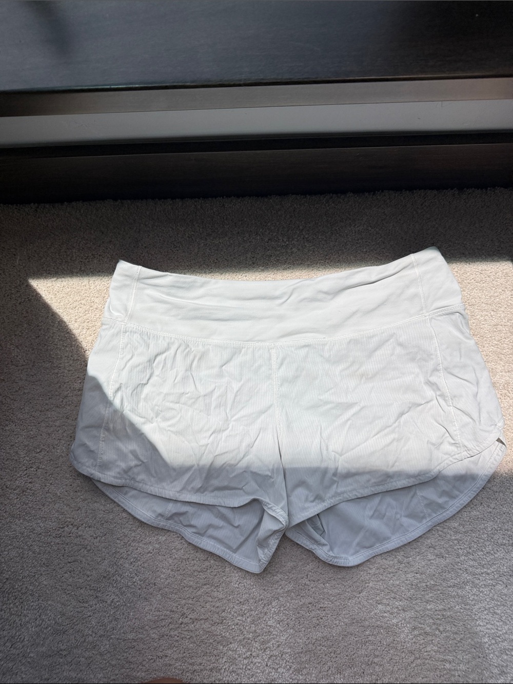 Lululemon white shorts 10 tall.